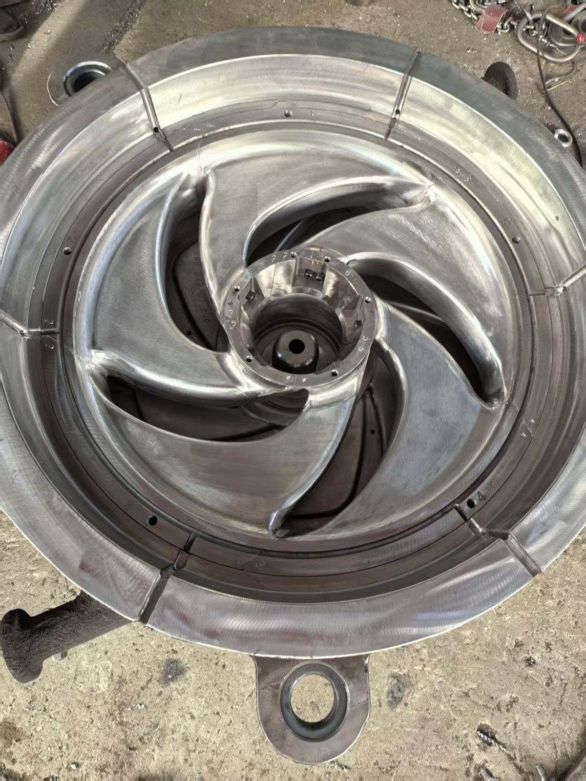 Cast impeller with spiral vanes